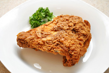 Crispy Fried Chicken on a White Plate