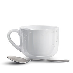 white cup with spoon.