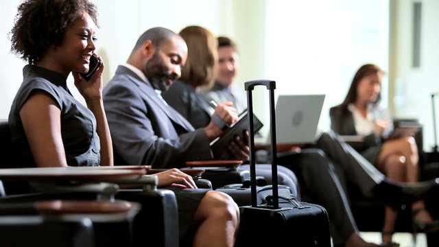 Business People Using Wireless Technology Airport Lounge