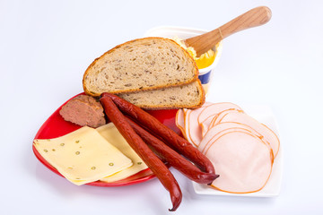 Breakfast meal with bread, ham and cheese