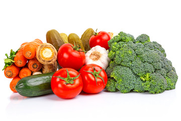 Composition with raw vegetables isolated on white