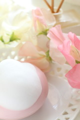 Pink facial soap and flower for beauty image