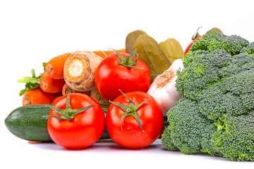 Composition with raw vegetables isolated on white