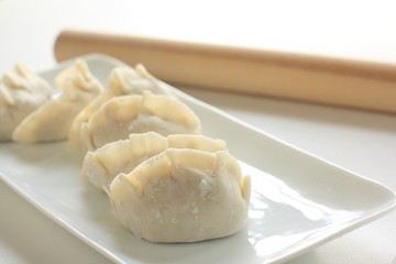 prepared chinese dumpling, gyoza on dish