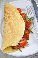 Pfannkuchen mit Chorizo, Tomaten und Rucola