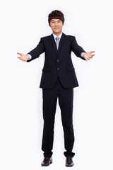 Young Asian business man showing welcom sign.