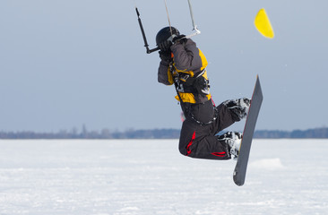Kiting on a snowboard
