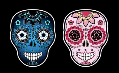 Two sugar skulls