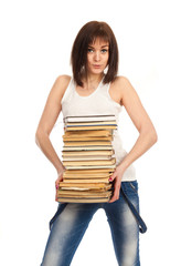Beautiful girl with a stack of books