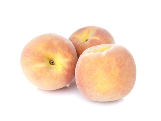 Fresh peaches isolated on white background