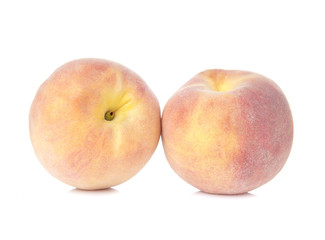Fresh peaches isolated on white background