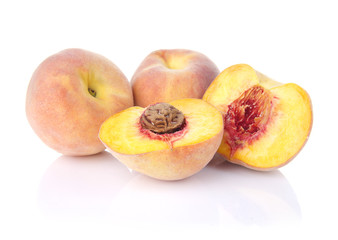 Fototapeta na wymiar Fresh peaches isolated on white background