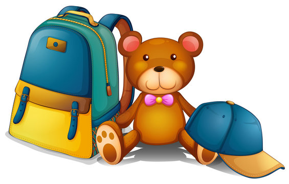 A backpack, a bear and a baseball cap