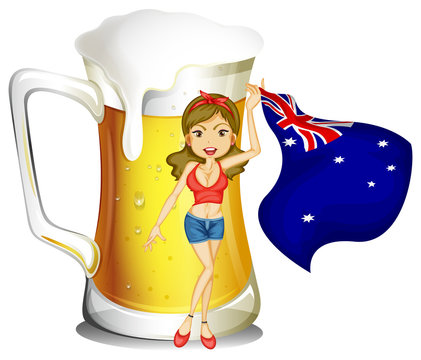 A girl with the flag of Australia in front of the big mug of bee