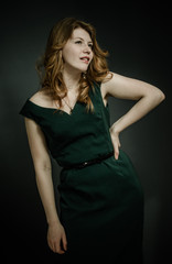 Fototapeta premium Beutiful young woman with red hairs