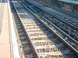Naklejka premium Rail tracks in bright summer day
