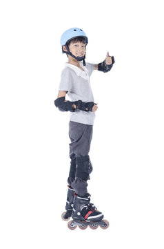 Smart boy playing roller blades over white background