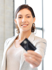 happy woman with credit card