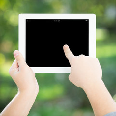 Man hands holding tablet PC