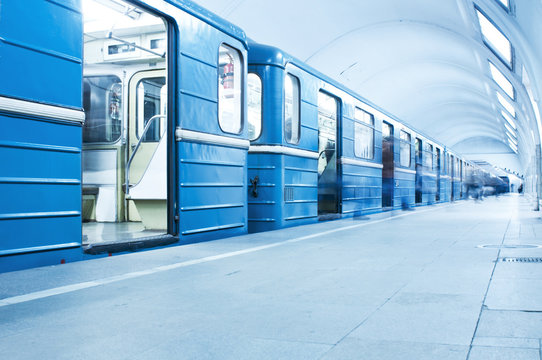 Blue train on subway station