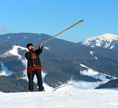 A man with trembitas