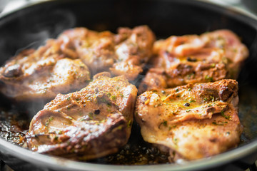 Chicken on frying pan