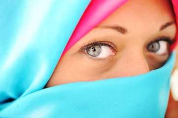 Fototapeta premium Young beautiful muslim woman in blue scarf