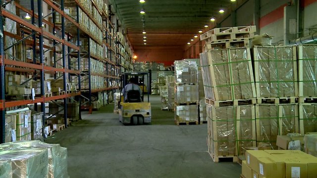 Work at the warehouse complex.