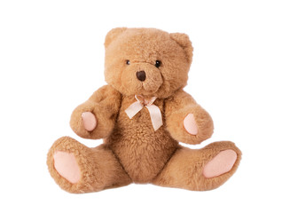 Classic teddy bear with pink bow isolated on white background