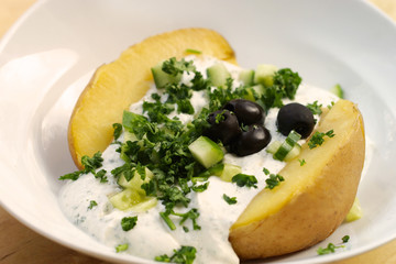 Baked Potato with Sour Cream..Shallow DOF