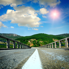asphalt road with the sky