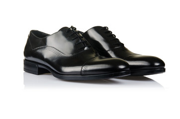Fashion concept with male shoes on white