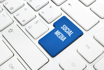 Social Media business concept button or key on white keyboard