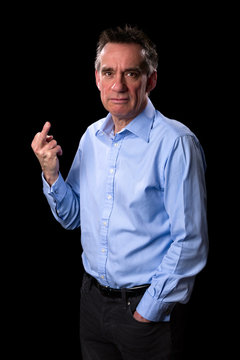 Angry Frowning Middle Age Business Man Giving One Finger Gesture