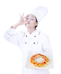 Delicious pizza hold by chef