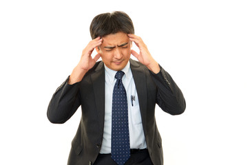 頭痛を訴える男性