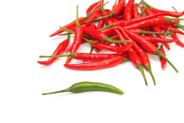 green chili in plie of red chili
