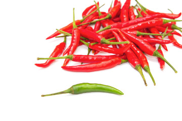 green chili in plie of red chili