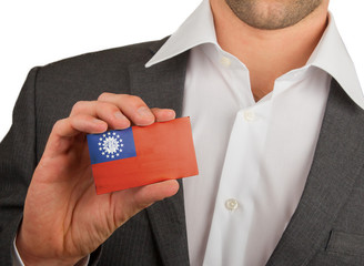 Businessman is holding a business card, Myanmar
