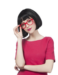 Brunette girl in glasses at white background.