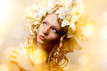 Beauty woman with white lily flowers