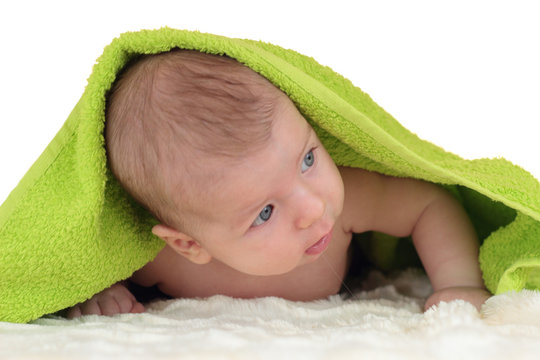 A Portrait Of Cute Baby With A Blanket Over His Head