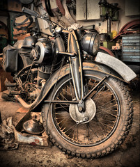 Fototapeta premium HDR style old retro motorcycle in garage