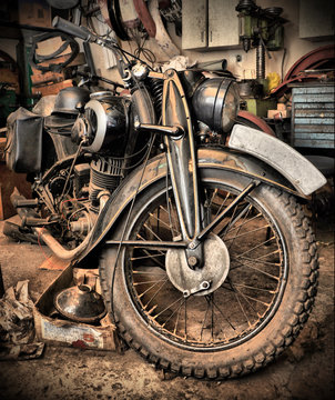 HDR style old retro motorcycle in garage