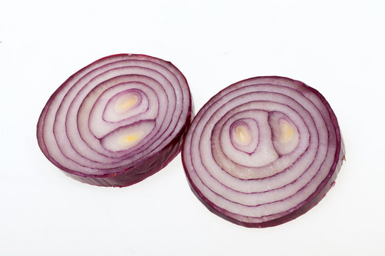 sliced onion isolated on white