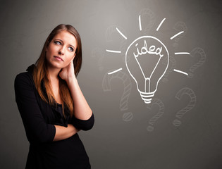 Young girl comming up with a light bubl idea sign