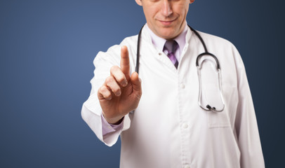 Middle aged doctor gesturing with copy space