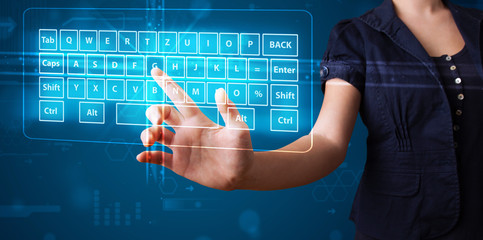 Girl pressing virtual type of keyboard