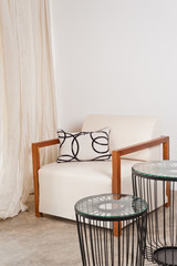Bright white armchair in a living room