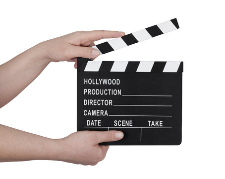 Hands holding a film clapperboard with clipping path